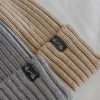 Zimowa czapka z wełny merino - BEIGE MELANGE